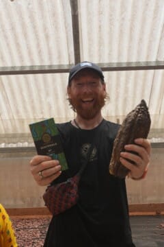 ali with cacao pod